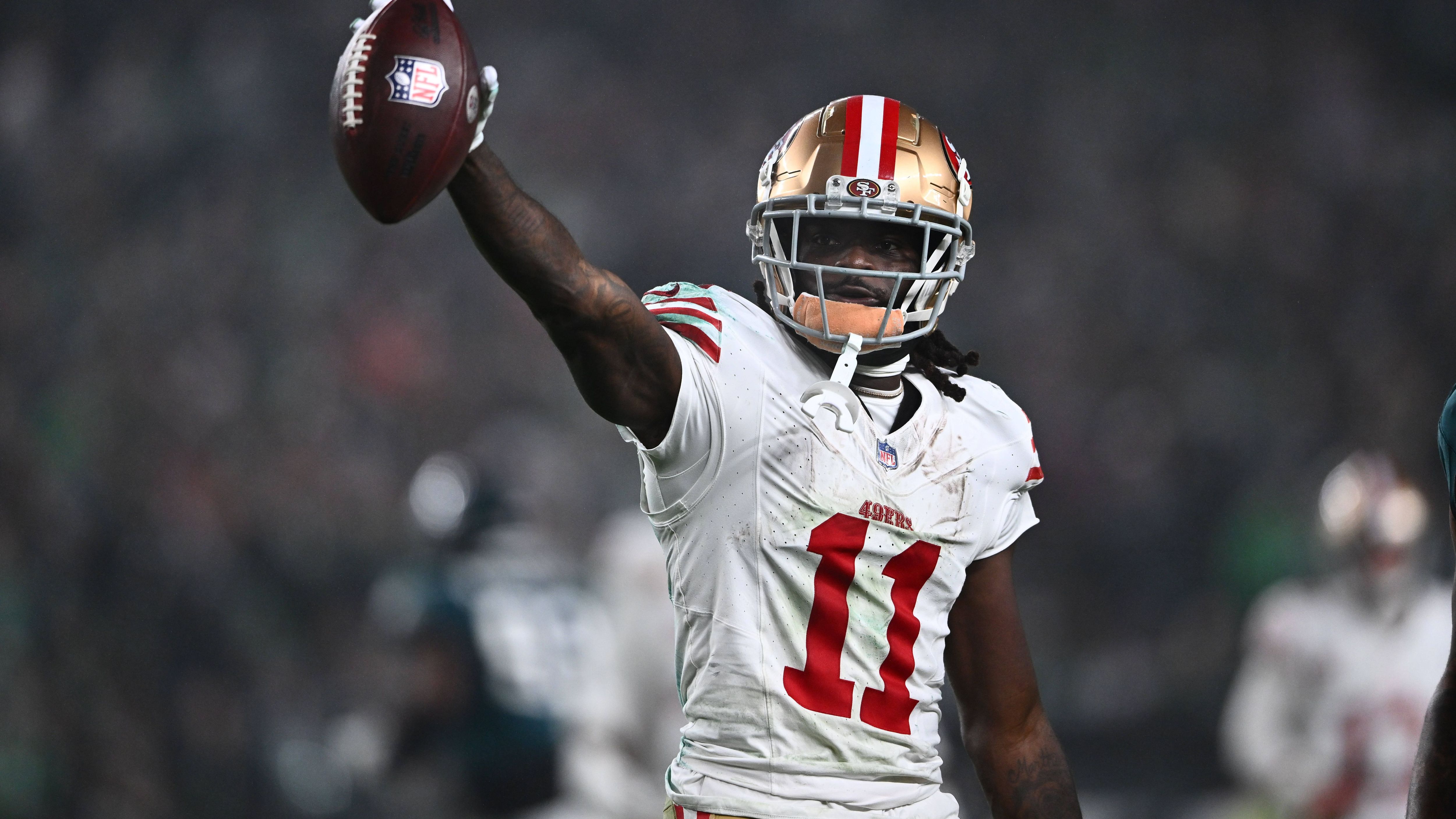 <strong>Brandon Aiyuk (San Francisco 49ers)</strong><br>Dazu forderte er jüngst sogar einen Trade. Zu einem Wechsel kam es nicht. Aiyuk ist bei den 49ers die wichtigste Anspielstation für Quarterback Brock Purdy. Bei einer Verlängerung könnte Aiyuk ein fettes Gehalt in ähnlichen Dimensionen wie Amon-Ra St. Brown und Tyreek Hill (beide 30 Millionen Dollar im Jahr) winken.