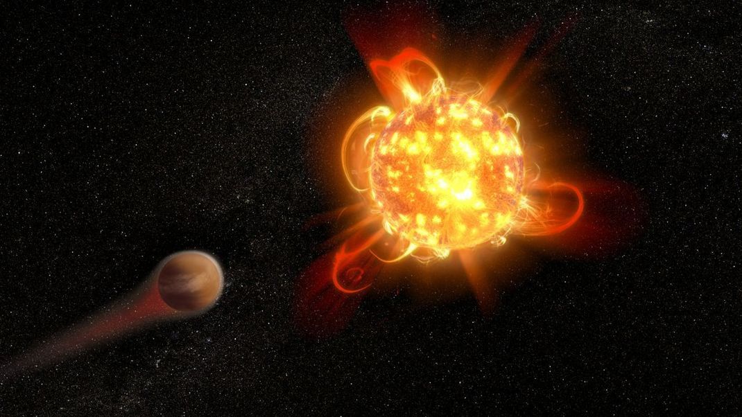 Sterne ohne Ruhe: Die meisten Muttersterne der bisher gefundenen Exoplaneten sind rote Zwerge. Dieser Sternentype schleudert eruptionsartig tödliche Strahlung ins All, die keimendes Leben immer wieder auslöschen würde. Wie das aussehen könnte zeigt diese Illustration.