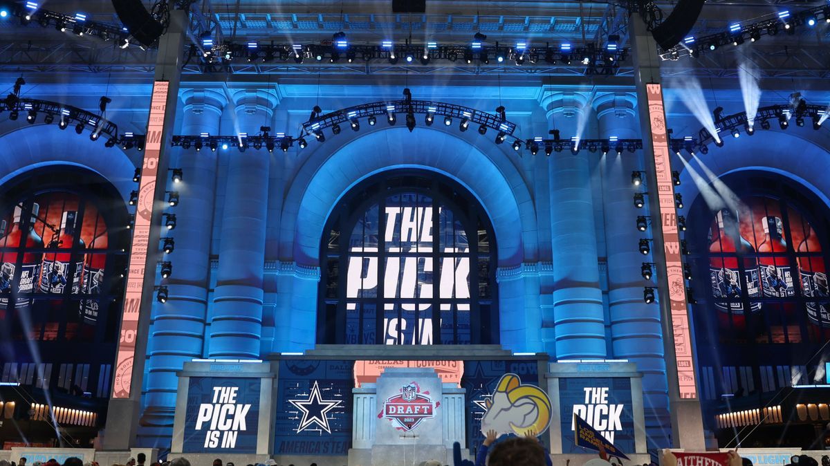 KANSAS CITY, MO - APRIL 28: The stage is lit up in blue as it announces The Pick Is In for the Dallas Cowboys in the third round of the NFL, American Football Herren, USA Draft on April 28, 2023 at...