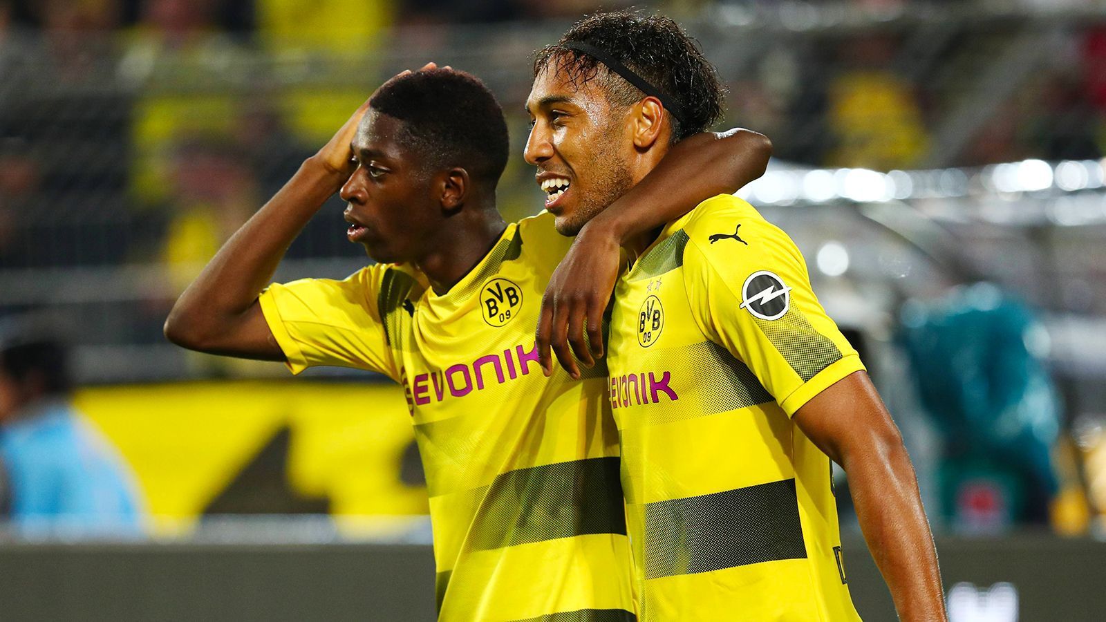 
                <strong>Das wurde aus den BVB-Abgängen der letzten Jahre</strong><br>
                Pierre-Emerick Aubameyang und Ousmane Dembele verließen den BVB mit viel Getöse und blieben auch nach ihrem Abschied im Fokus. Aber wer hat mitbekommen, dass zwei ehemalige BVB-Kicker in Spanien vor Real und Barca um die Tabellenspitze kämpfen? Oder ein anderer in den Niederlanden auf dem Weg zurück in das DFB-Team ist? Einige Ex-Dortmunder machen nach ihrem Wechsel ins Ausland gehörig auf sich aufmerksam. ran.de zeigt euch, wie sich die namhaftesten BVB- Abgänge der letzten Jahre schlagen.
              