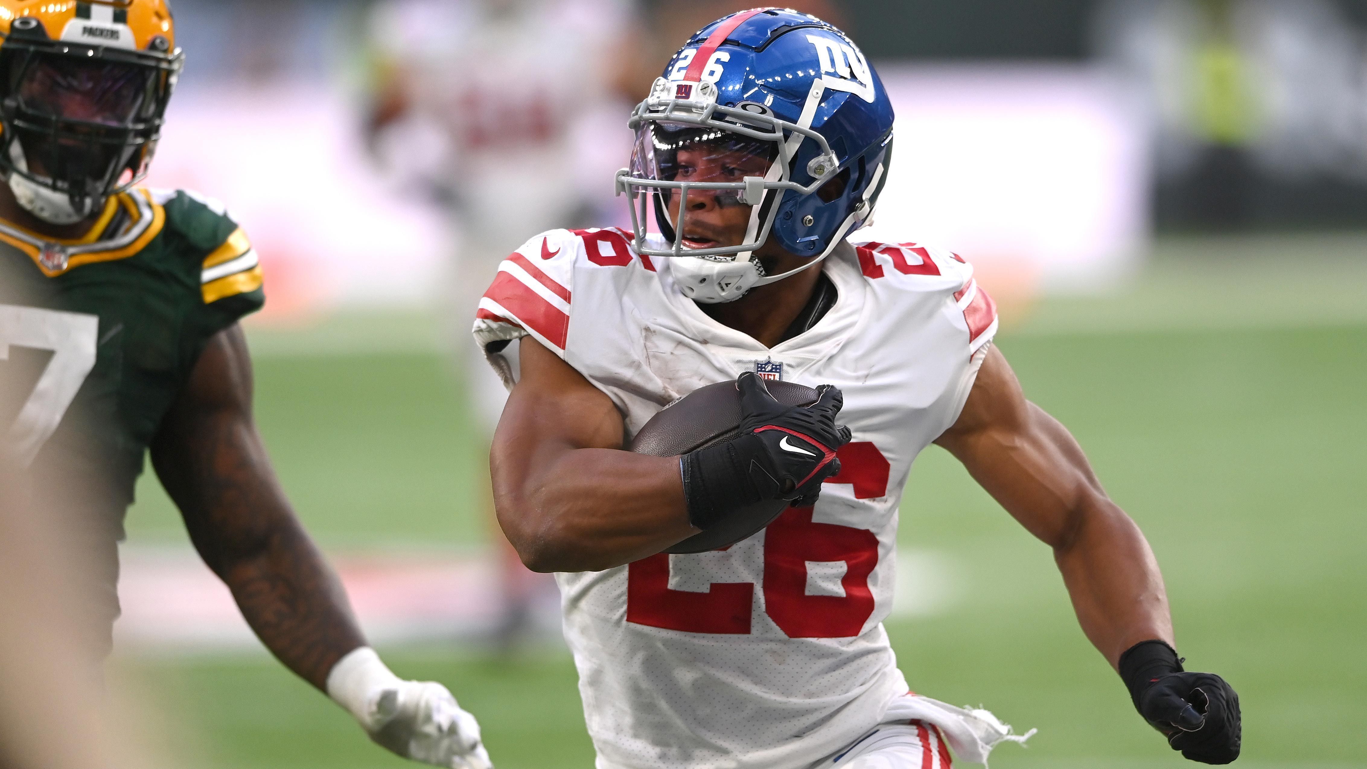 
                <strong>New York Giants</strong><br>
                Mit zu diesem Erfolg beigetragen hat auch Giants' Running Back Saquon Barkley, über den fast alles in der Offensive läuft. Das Kraftpaket steht bereits bei 533 Rushing Yards und drei Touchdowns. Gegen die Packers kehrte er nach einer kurzen Verletzungspause wieder aufs Spielfeld zurück und besorgte den Giants die nächsten Punkte.
              