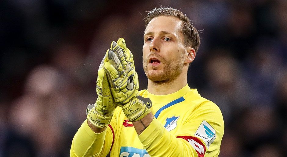 
                <strong>Oliver Baumann</strong><br>
                Tor: Oliver Baumann (TSG 1899 Hoffenheim). Der Keeper war für sein Team ein verlässlicher Rückhalt und trug so dazu bei, dass wir die TSG in der kommenden Spielzeit mindestens in der Champions-League-Qualifikation sehen. Genau deshalb setzt er sich in der ran-Top-Elf auch gegen die starken Konkurrenten um Manuel Neuer oder Roman Bürki durch.
              