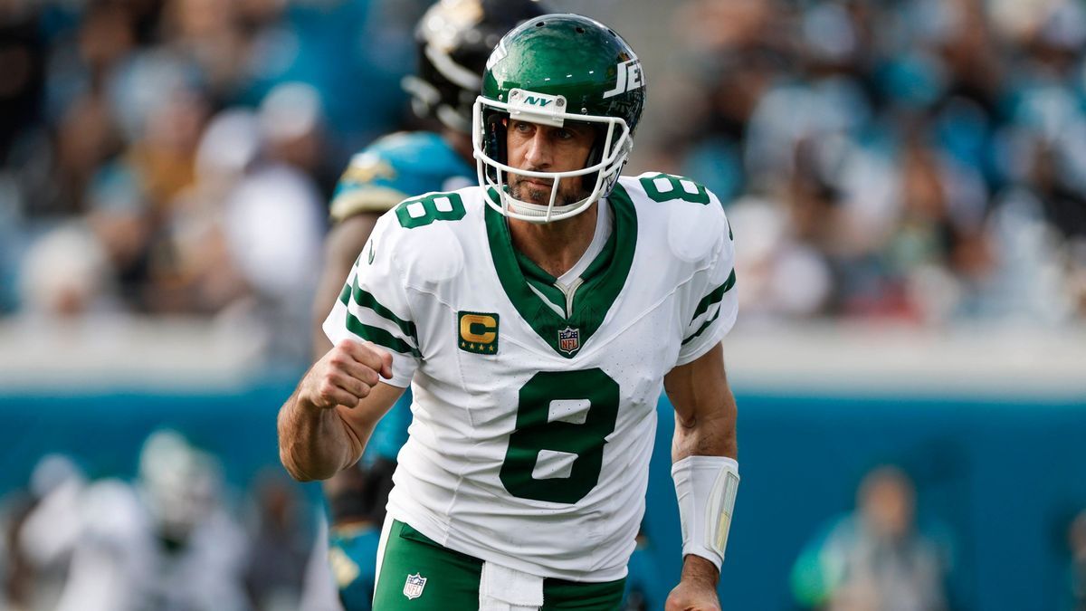 JACKSONVILLE, FL - DECEMBER 15: New York Jets quarterback Aaron Rodgers (8) reacts after throwing a touchdown pass during the game between the Jacksonville Jaguars and the New York Jets on December...