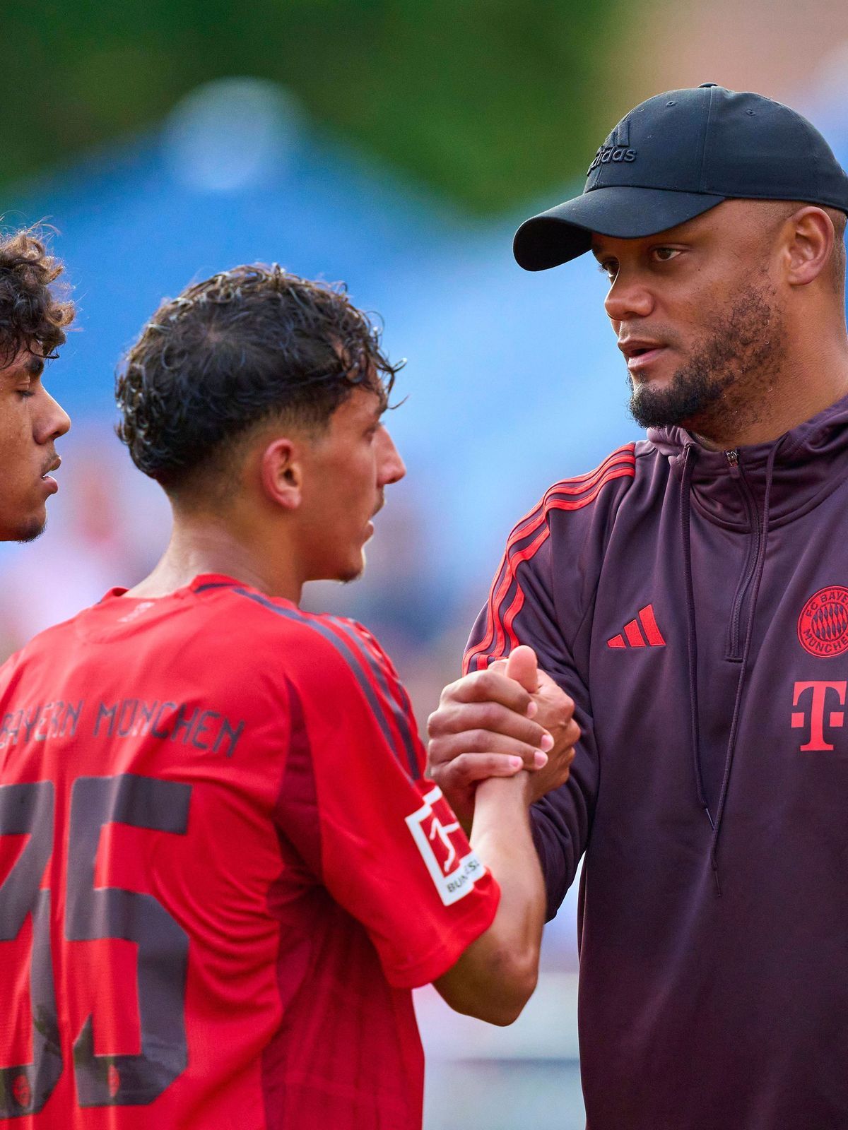 Trainer Vincent Kompany (FCB), team manager, headcoach, coach, Adam Aznou, FCB 48 Mudaser Sadat, FCB 35 at the friendly match FC ROTTACH-EGERN - FC BAYERN MÜNCHEN 1-14 in the Training Camp at Stadi...