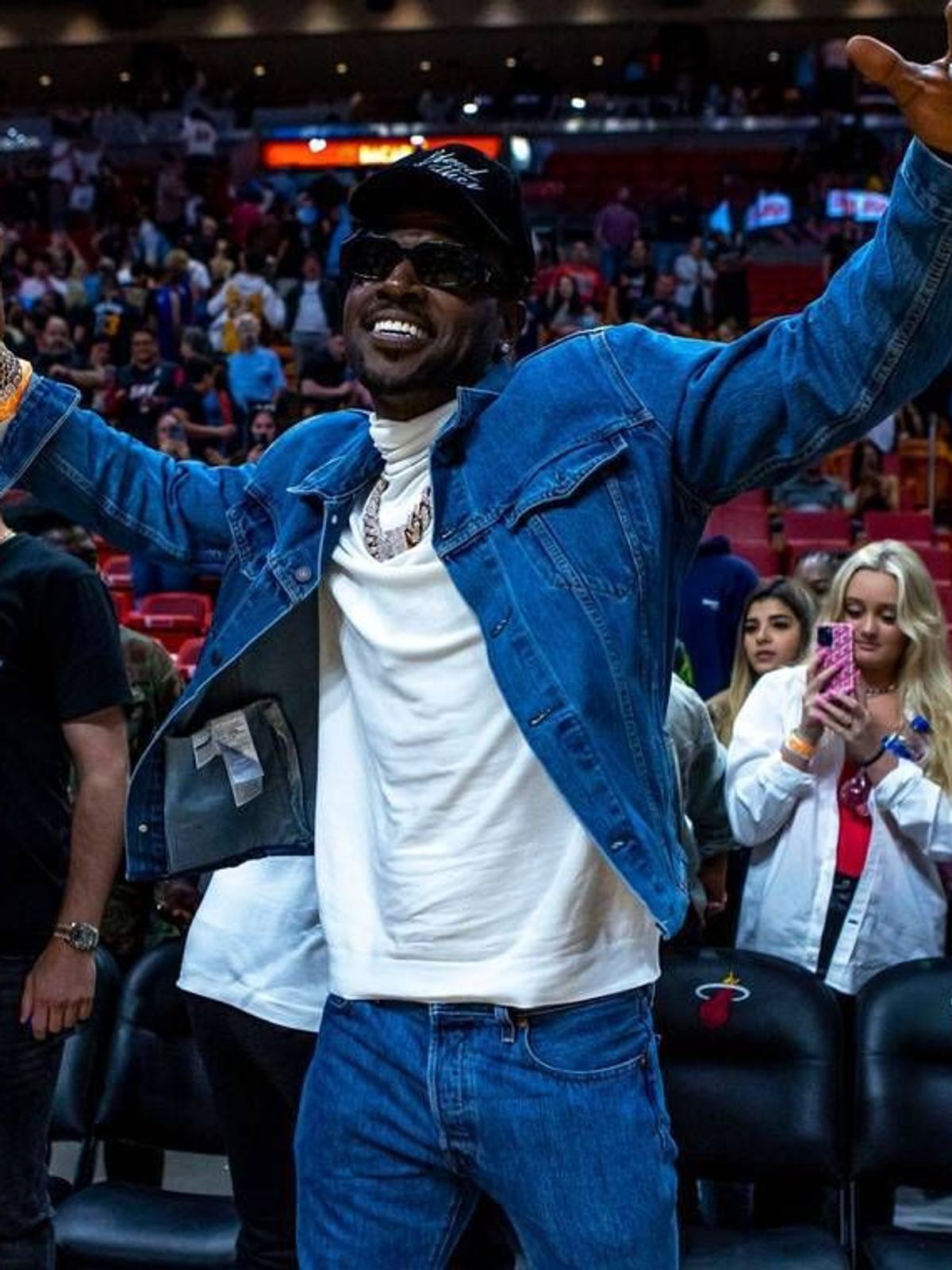 July 11, 2025: Former NFL wide receiver Antonio Brown reacts courtside after the Miami Heat defeated Detroit 105-98 after four quarters of an NBA game at FTX Arena in Downtown Miami, Florida, on Tu...