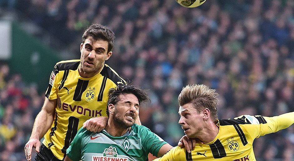 
                <strong>Sokratis</strong><br>
                Anfangs noch beschäftigungslos, war er wie seine Nebenleute nicht immer sicher. Man merkte ihm an, dass er zuletzt angeschlagen war. Verlor in der zweiten Halbzeit das Duell gegen den Bremer Torschützen Fin Bartels. ran-Note: 4
              