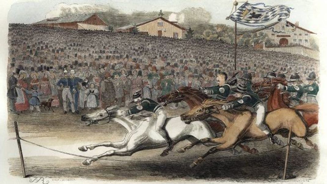 Das Rennen um die Wiesn: Am Anfang, 1810, war das Oktoberfest ein Pferderennen. Dieser kolorierte Holzstich stammt von 1845. Das Pferderennen wurde erst zwischen den beiden Weltkriegen als fester Bestandteil des Volksfestes abgeschafft.