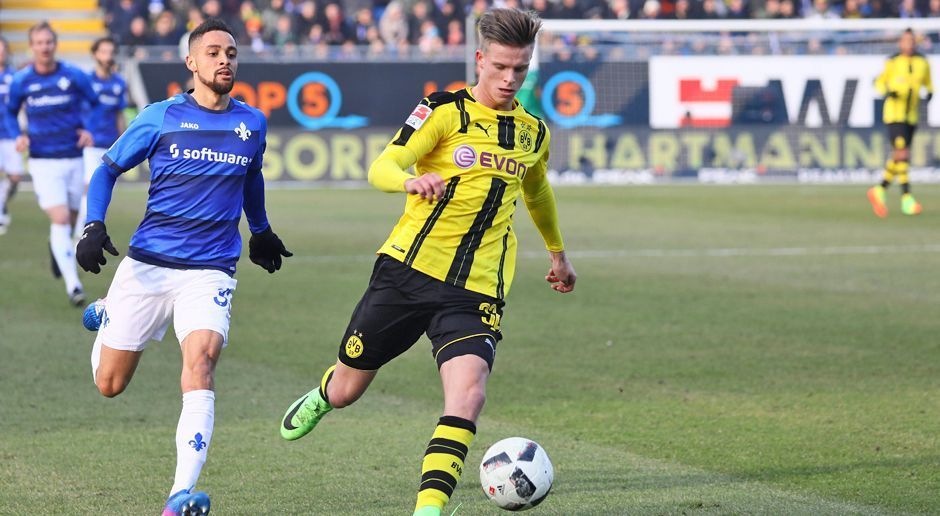 
                <strong>Burnic' Liga-Debüt gegen Darmstadt</strong><br>
                Für Dzenis Durnic war das Auswärtsspiel am 20. Spieltag von Borussia Dortmund in Darmstadt eine ganz besondere Partie. Denn: Der 18-Jährige feierte sein Bundesliga-Debüt im BVB-Trikot, stand gegen den Tabellenletzten sogar in der Startelf und durfte 90 Minuten lang spielen. Nach über zehn Jahren im Verein erfüllte sich für Burnic damit der Wunsch eines jeden Nachwuchs-Talents. ran.de stellt den Bubi im BVB-Team einmal vor. 
              