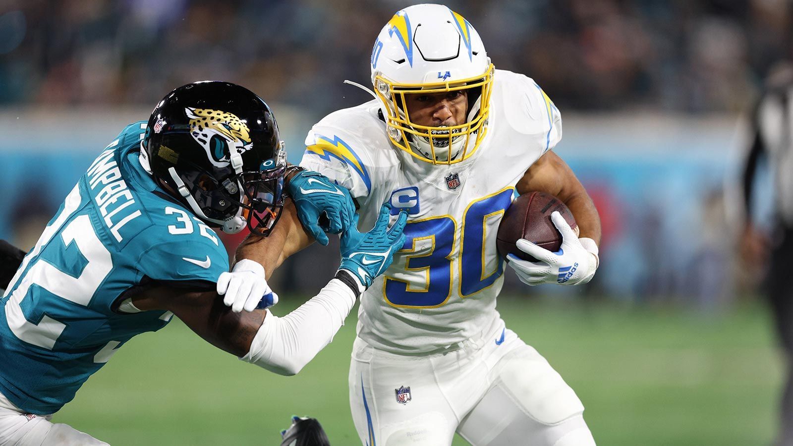 
                <strong>Platz 21 (geteilt): Austin Ekeler</strong><br>
                &#x2022; Rushing Touchdowns: 34<br>&#x2022; Aktuelles Team: Los Angeles Chargers<br>&#x2022; In der NFL seit: 2017<br>
              