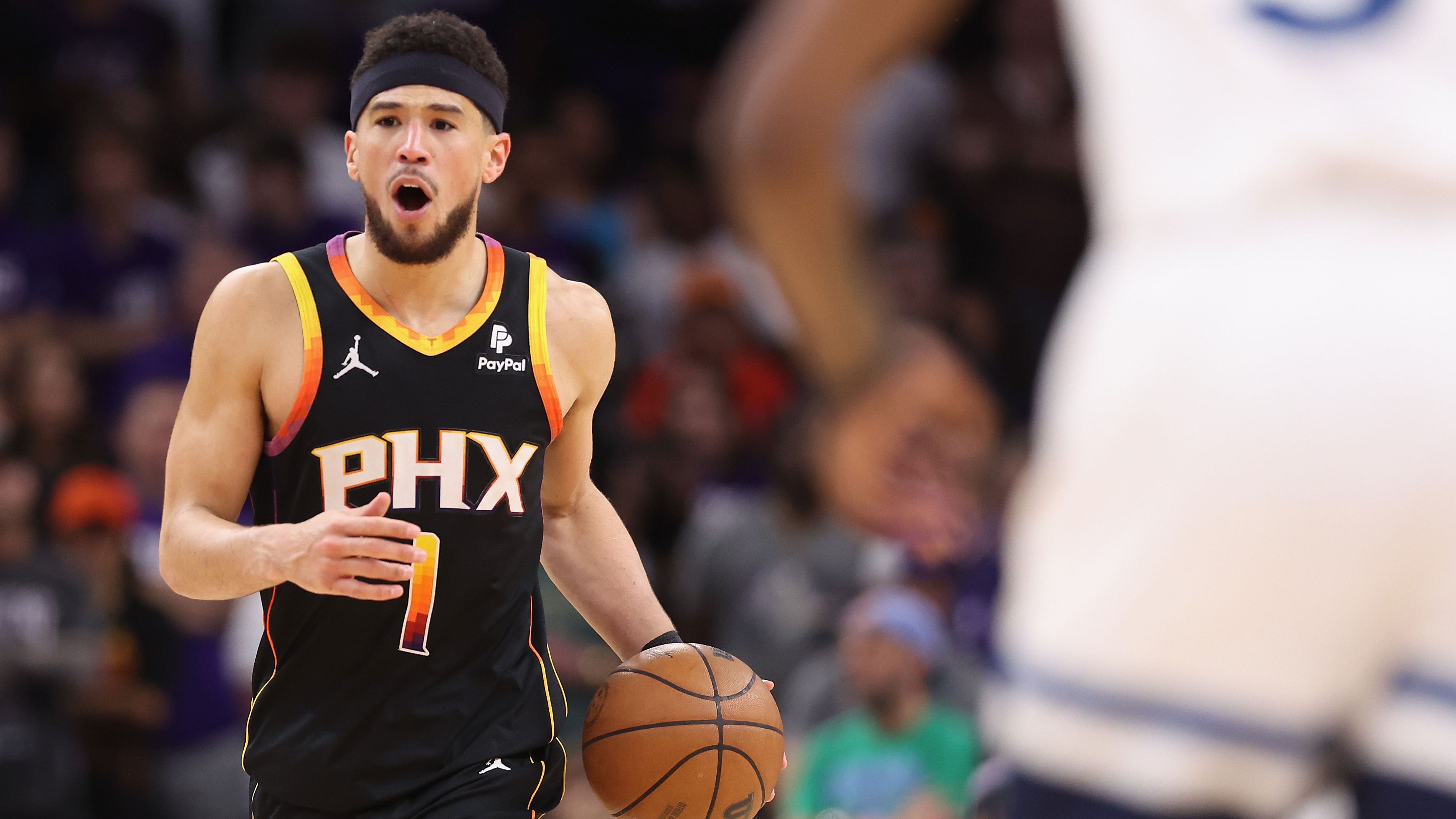 <strong>Third Team: Devin Booker</strong><br>- Team: Phoenix Suns<br>- Position: Point Guard