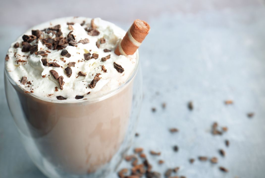 Glass with delicious cocoa cocktail, closeup