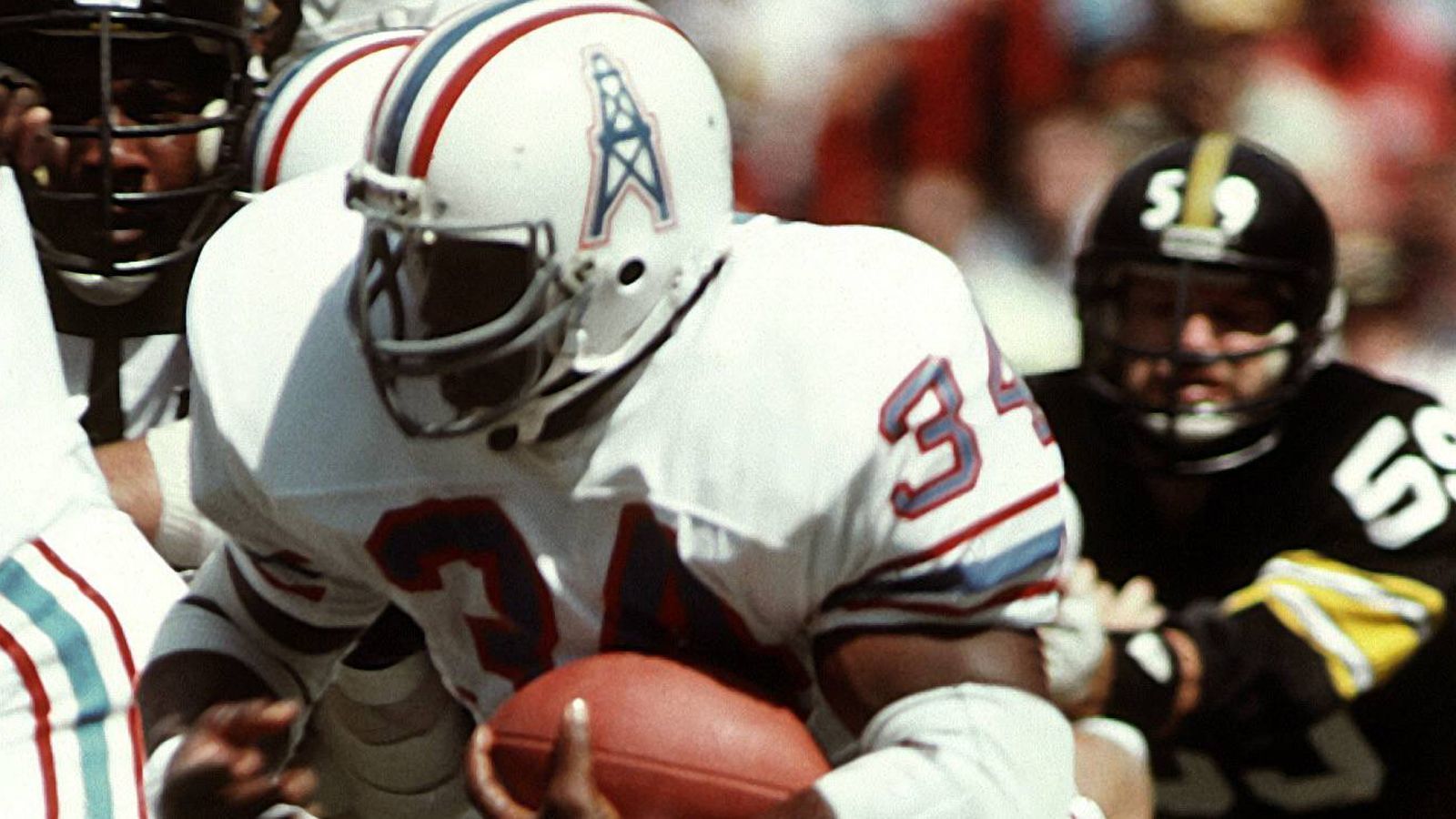 
                <strong>9. Earl Campbell</strong><br>
                Yards: 1.934Team: Houston OilersSaison: 1980
              