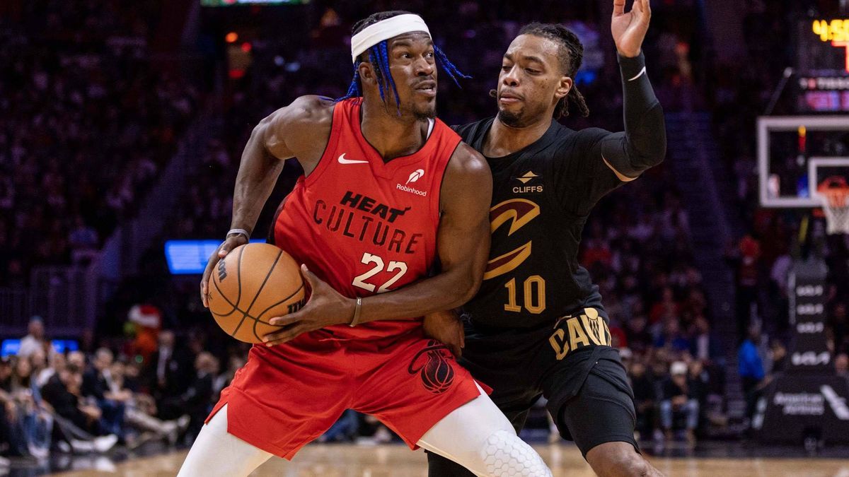 December 8, 2024, Miami, Florida, United States: Miami Heat forward Jimmy Butler (22) posts up on Cleveland Cavaliers guard Darius Garland (10) during the second half of an NBA game at the Kaseya C...