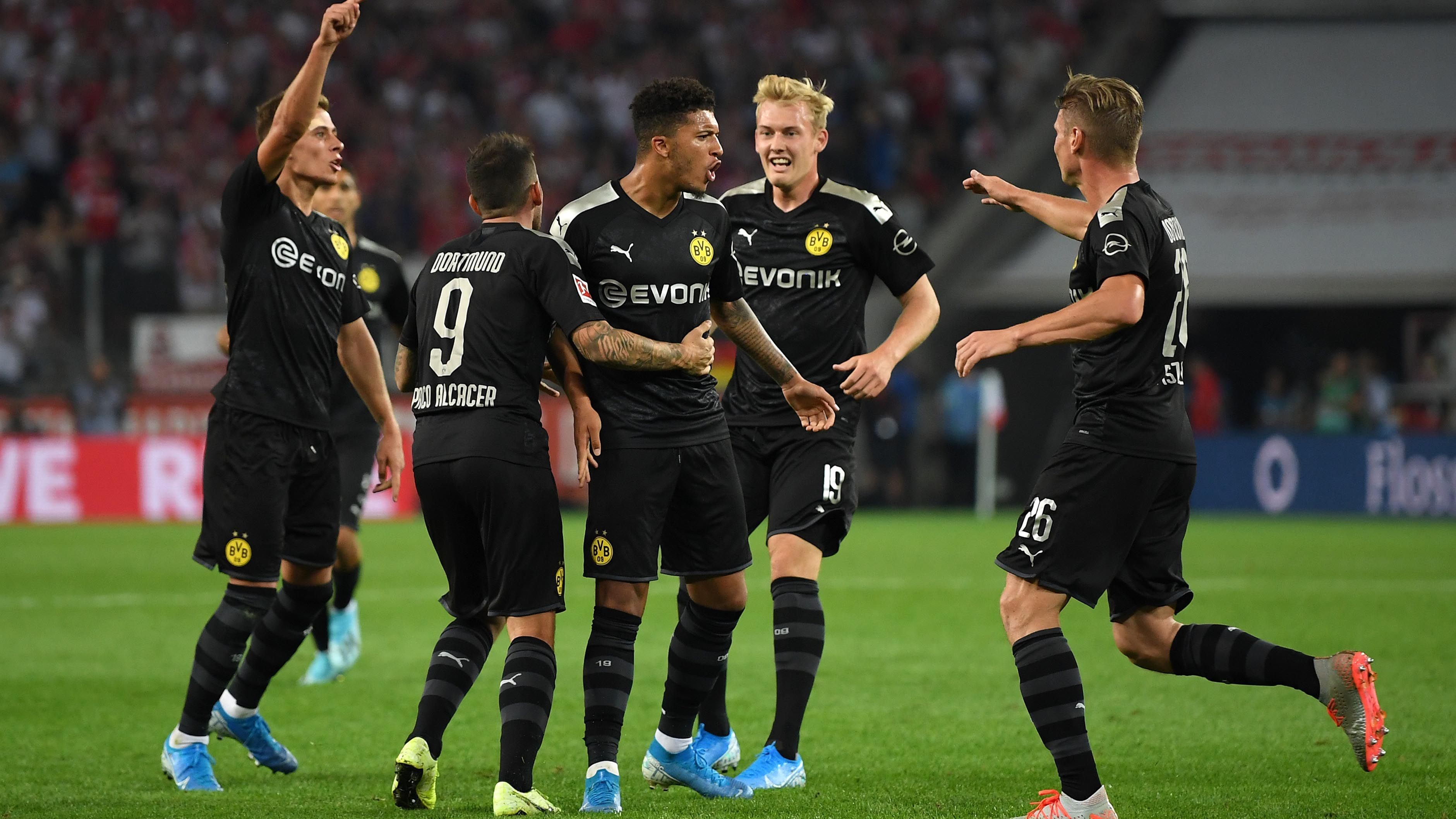 
                <strong>Die ran-Noten für Borussia Dortmund gegen den 1. FC Köln</strong><br>
                Borussia Dortmund feiert im zweiten Saisonspiel beim 1. FC Köln den zweiten Sieg. Wieder dreht der BVB einen 0:1-Rückstand noch in einen Sieg - auch dank eines glücklichen Händchens von Trainer Lucien Favre. Der BVB in der Einzelkritik.
              