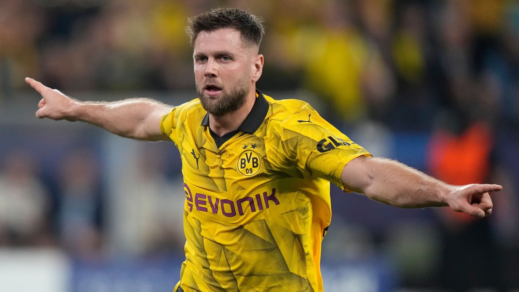 Niclas Füllkrug feiert sein Tor im Halbfinal-Hinspiel der Champions League.