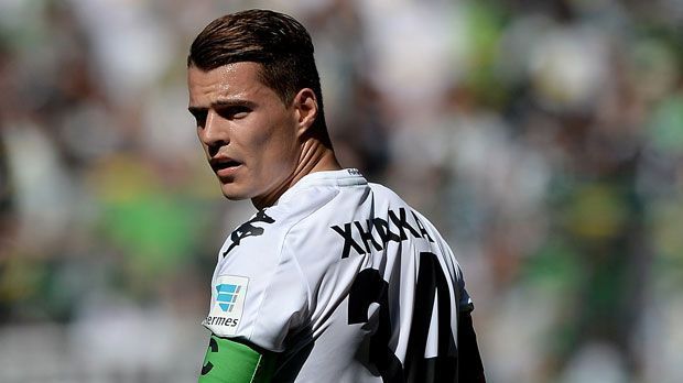 
                <strong>Granit Xhaka</strong><br>
                Der Transfer von Mittelfeld-Ass Granit Xhaka hat satte 45 Millionen Euro in Gladbachs Kassen gespült. Das Geld nimmt Sportdirektor Max Eberl nun in die Hand, um Ersatz für den Schweizer zu finden. Laut "kicker" will die Borussia Xhaka nicht "1:1" ersetzen. Denkbar sei die Verpflichtung mehrerern Spielern. ran.de stellt die Kandidaten vor.
              