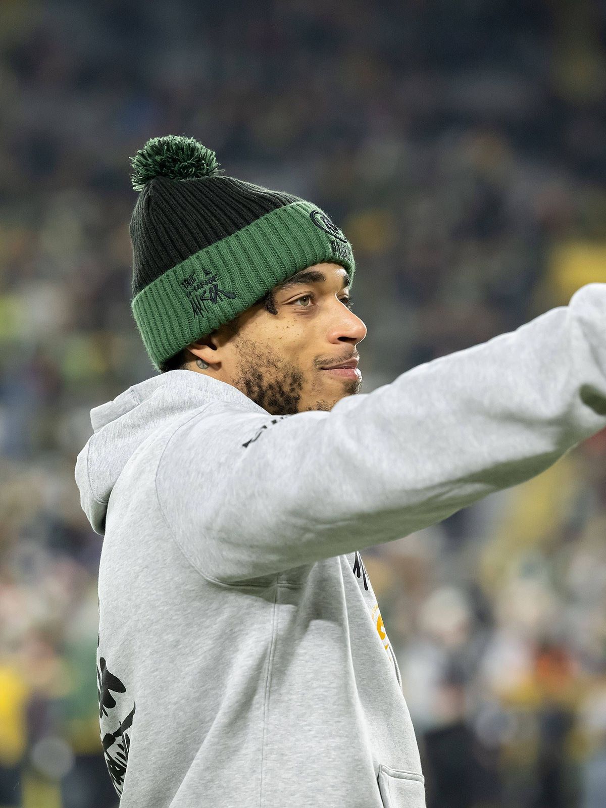 December 23, 2024: Green Bay Packers cornerback Jaire Alexander (23) greets fans before the game against the New Orleans Saints in Green Bay, WI. Cal Media. Green Bay United States of America - ZUM...
