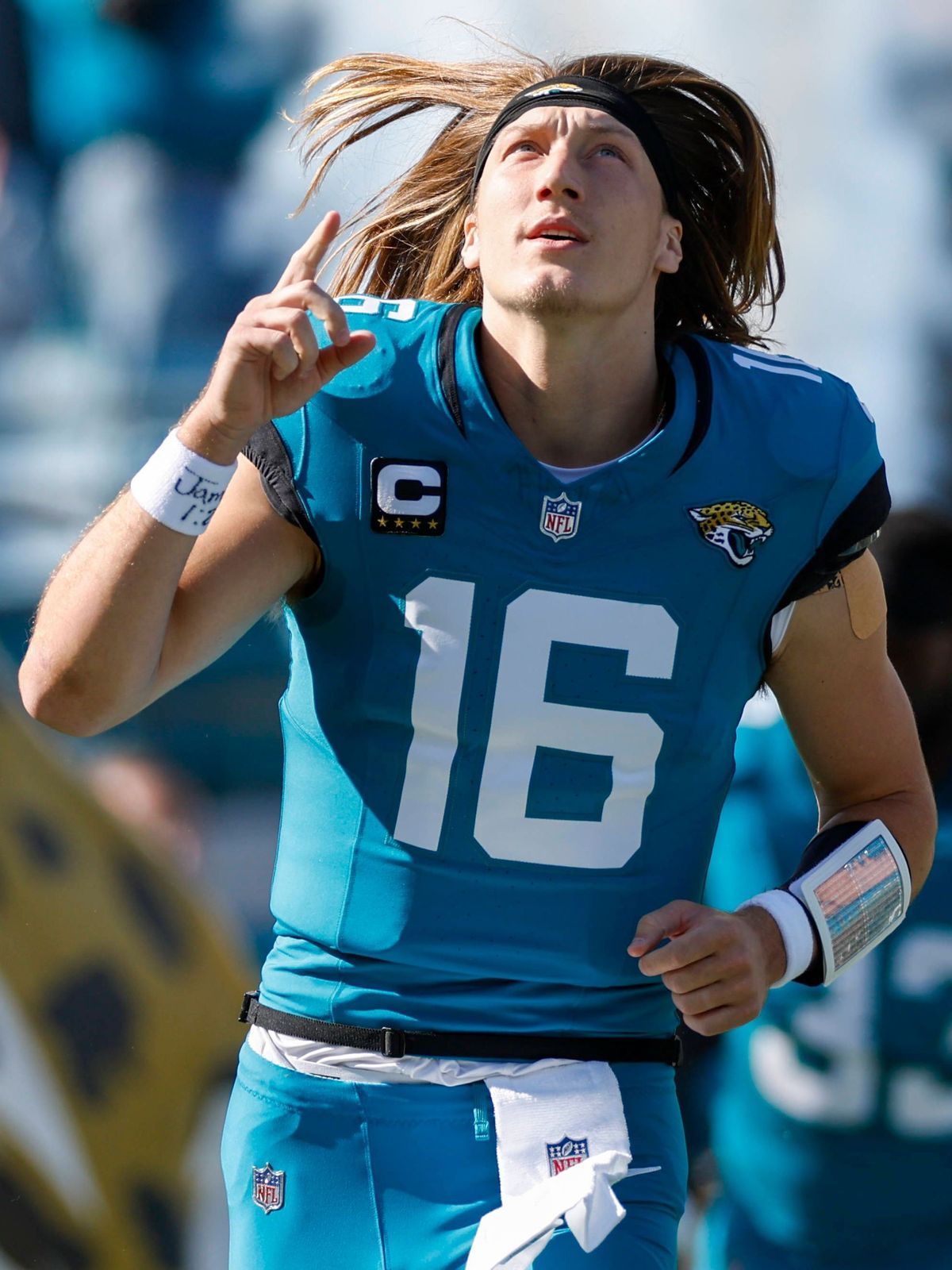 JACKSONVILLE, FL - DECEMBER 01: Jacksonville Jaguars quarterback Trevor Lawrence (16) runs out on the field before the game between the Jacksonville Jaguars and the Houston Texans on December 1, 20...