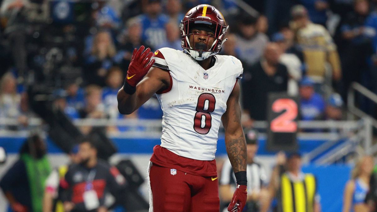 Washington Commanders vs Detroit Lions DETROIT,MICHIGAN-January 18: Washington Commanders running back Brian Robinson Jr. 8 reacts after scoring a touchdown during the first half of an NFL, America...
