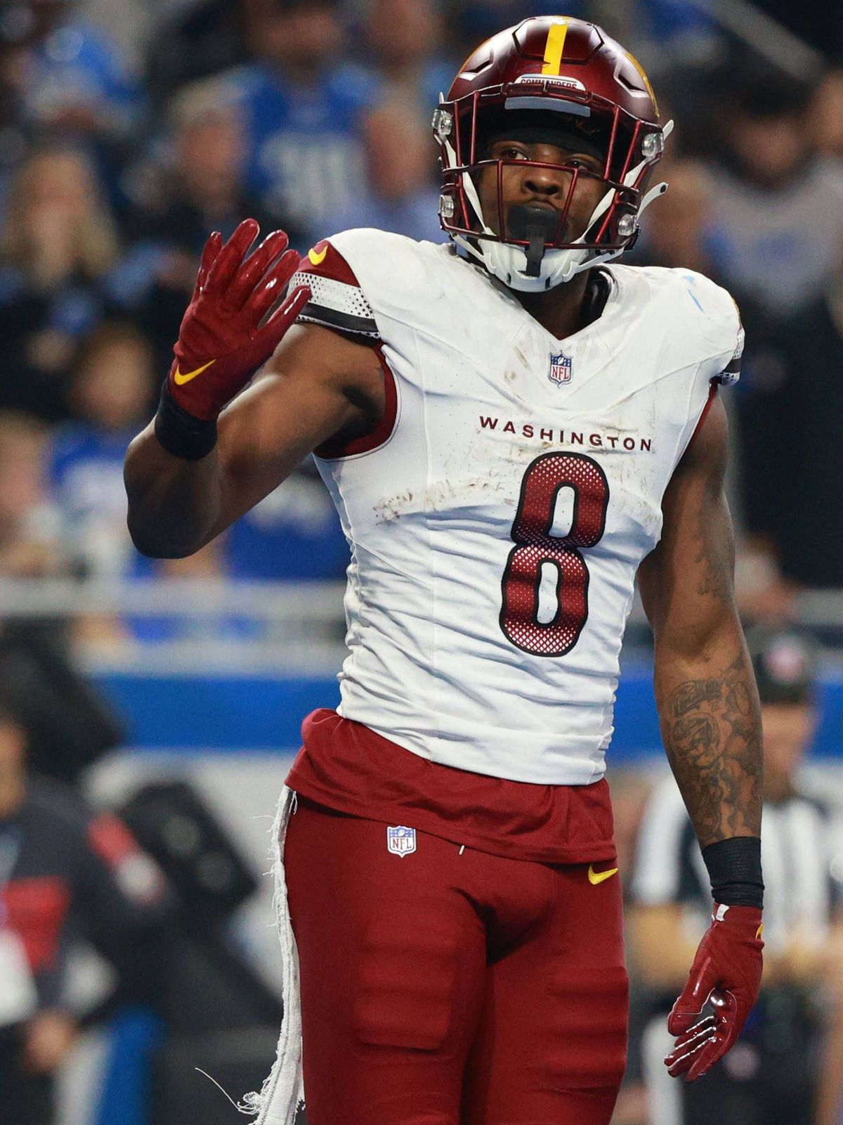Washington Commanders vs Detroit Lions DETROIT,MICHIGAN-January 18: Washington Commanders running back Brian Robinson Jr. 8 reacts after scoring a touchdown during the first half of an NFL, America...