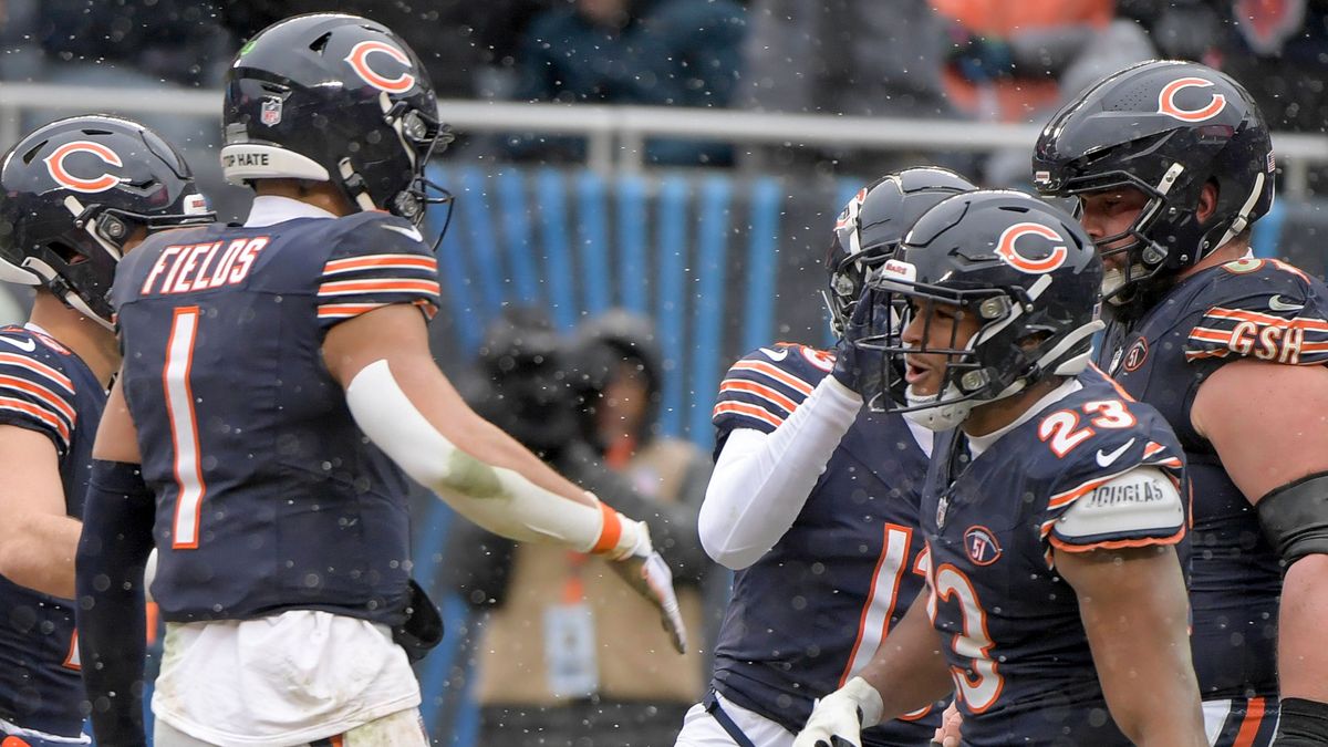 Chicago Bears Justin Fields (1) and Roschon Johnson (23) celebrate a second quarter touchdown against the Atlanta Falcons at Soldier Field in Chicago on Sunday, December 31, 2023. PUBLICATIONxINxGE...