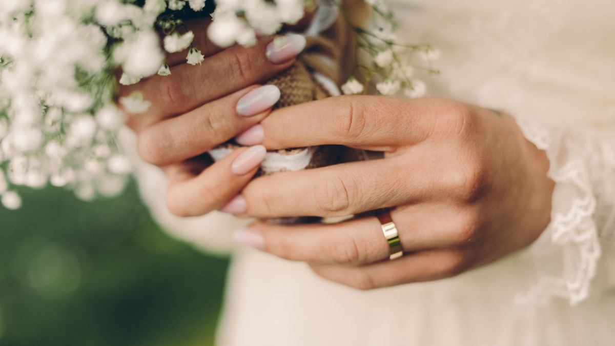 hands of the groom and the bride