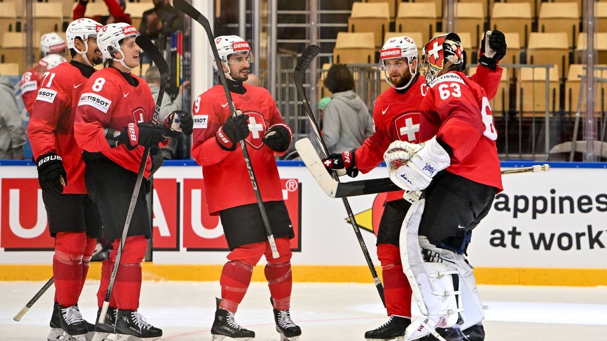 ODENSE, DENMARK - MAY 22: Switzerland celebrate the victory during the 2025 Ice hockey, Eishockey World Championship, WM, Weltmeisterschaft match between Switzerland and Austria at Jyske Bank Arena...