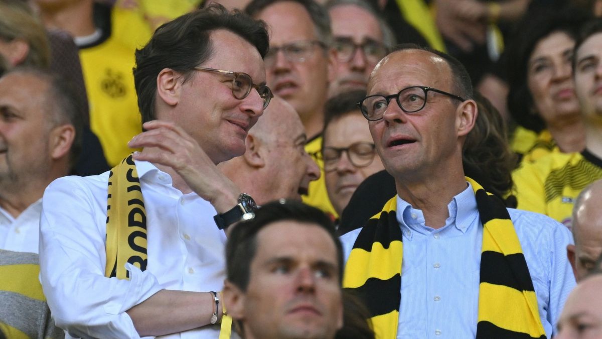 Friedrich Merz (r.) drückt die Daumen