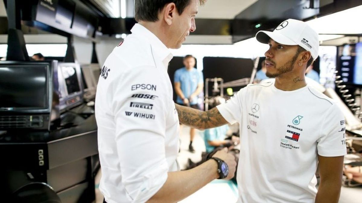 Mercedes-Motorsportchef Wolff und Weltmeister Hamilton