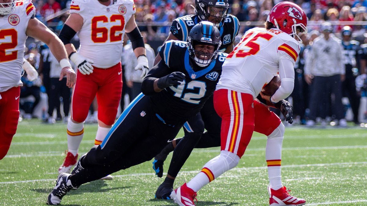 November 24, 2024: Carolina Panthers defensive end Jonathan Harris (92) sacks Kansas City Chiefs quarterback Patrick Mahomes (15) during the second quarter of the NFL, American Football Herren, USA...