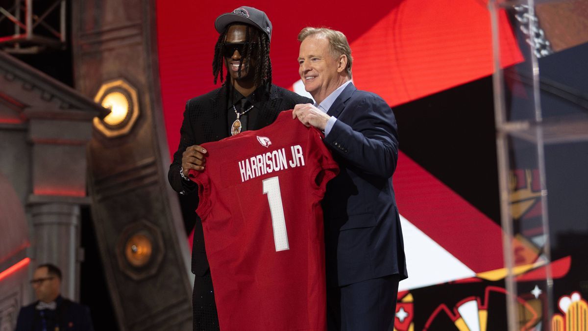 DETROIT, MI - APRIL 25: Marvin Harrison Jr. poses with NFL, American Football Herren, USA Commissioner Roger Goodell moments after the Arizona Cardinals selected Harrison fourth overall during day ...