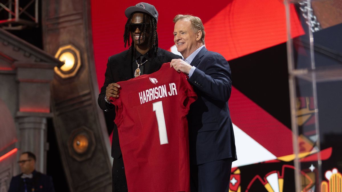 DETROIT, MI - APRIL 25: Marvin Harrison Jr. poses with NFL, American Football Herren, USA Commissioner Roger Goodell moments after the Arizona Cardinals selected Harrison fourth overall during day ...