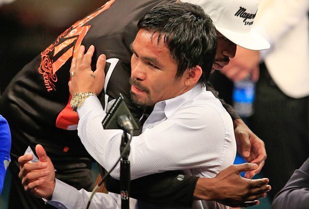 
                <strong>Mayweather vs. Pacquiao: Die Bilder zum Mega-Fight</strong><br>
                Auf der Pressekonferenz nach dem Kampf legten Beide die Show für Sekunden nieder und zeigten ihren Respekt füreinander.
              