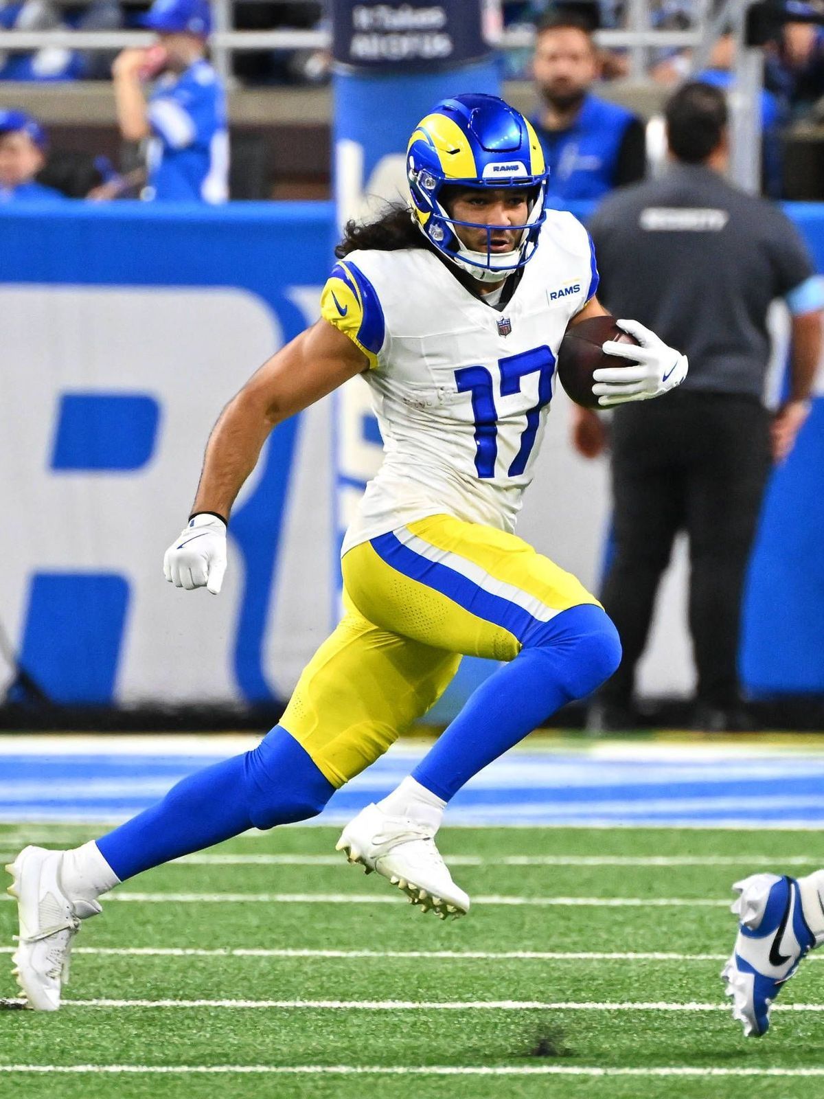 DETROIT, MI - SEPTEMBER 08: Los Angeles Rams wide receiver Puka Nacua (17) takes a hand off and runs wide for a gain during the Detroit Lions versus the Los Angeles Rams game on Sunday September 8,...