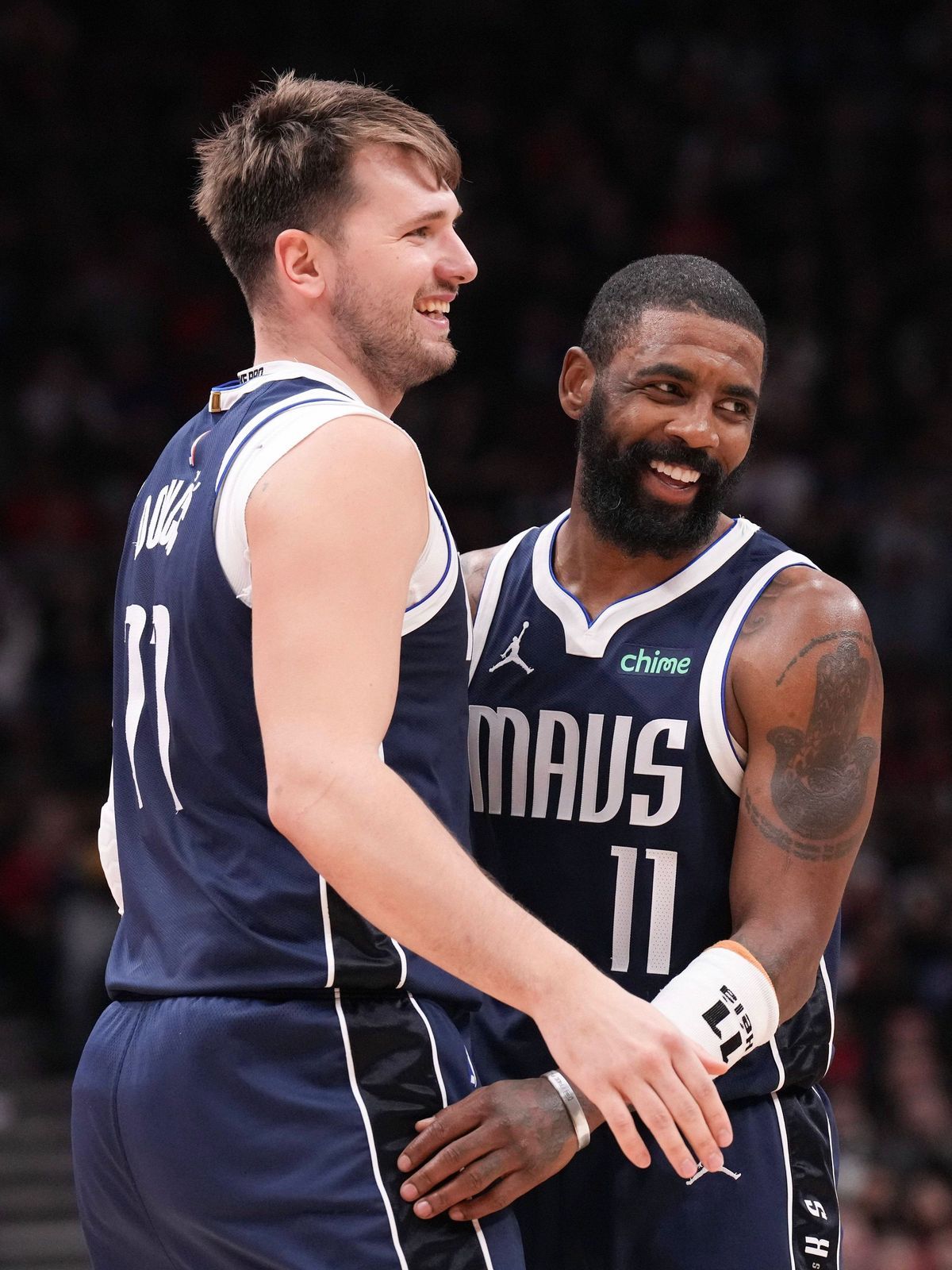 February 28, 2024, Toronto, On, CAN: Dallas Mavericks Luka Doncic and Kyrie Irving react during their team s win over the Toronto Raptors in NBA, Basketball Herren, USA basketball action in Toronto...