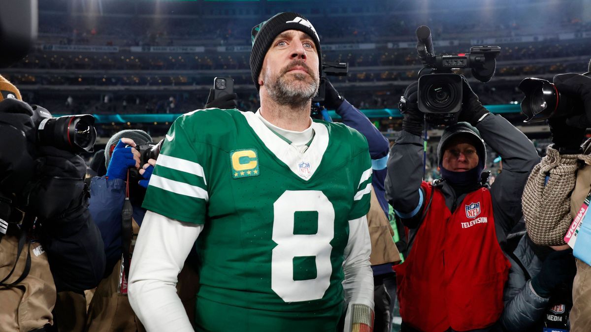 New York Jets quarterback Aaron Rodgers walks on the field after the game against the Miami Dolphins where he threw his 500th touchdown pass in his 20-year career in the final week of the NFL, Amer...