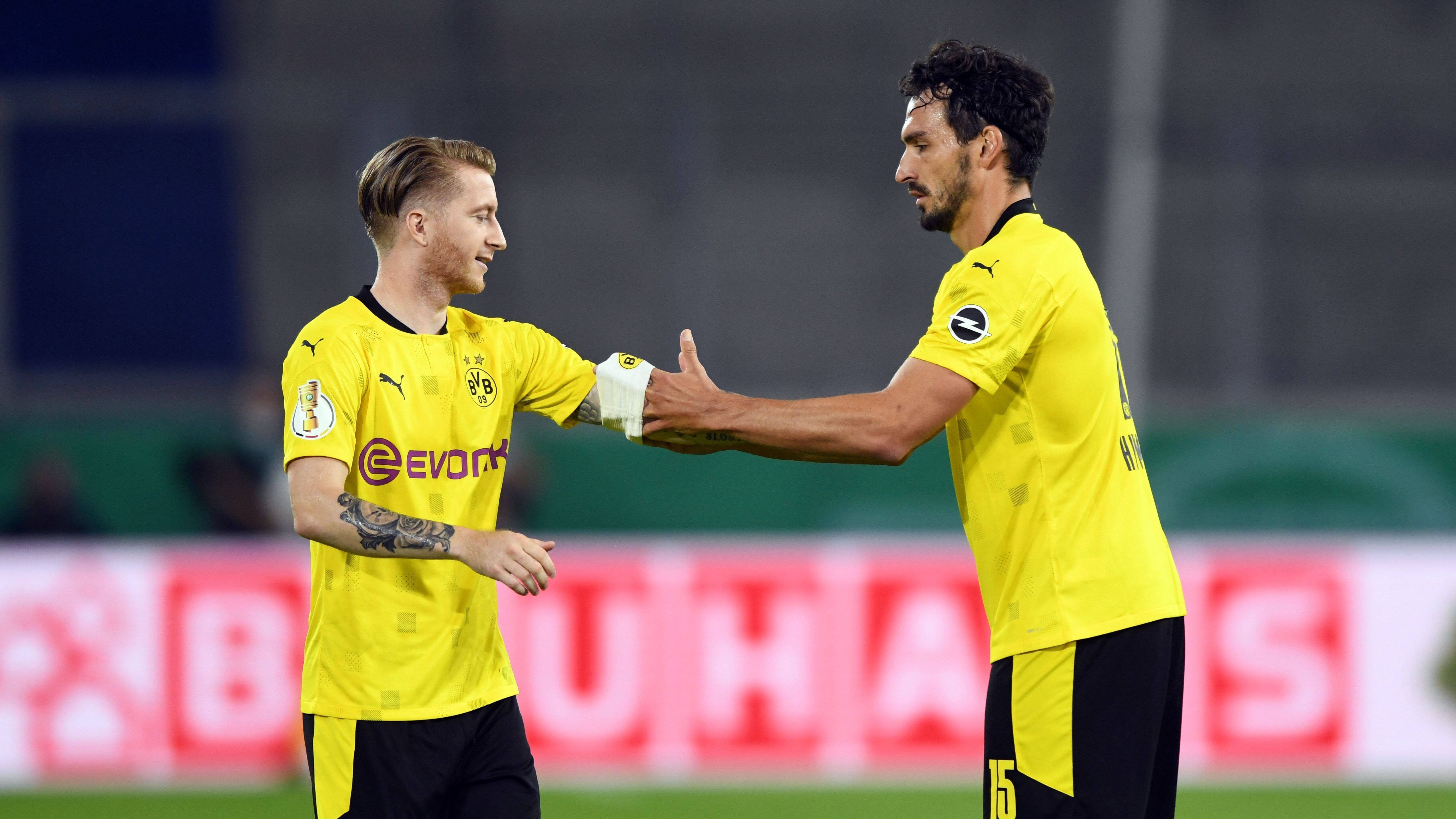 
                <strong>Borussia Dortmund</strong><br>
                1. Marco Reus (Kapitän)2. Mats Hummels3. Axel WitselWeitere Mitglieder: Thomas Delaney, Emre Can
              