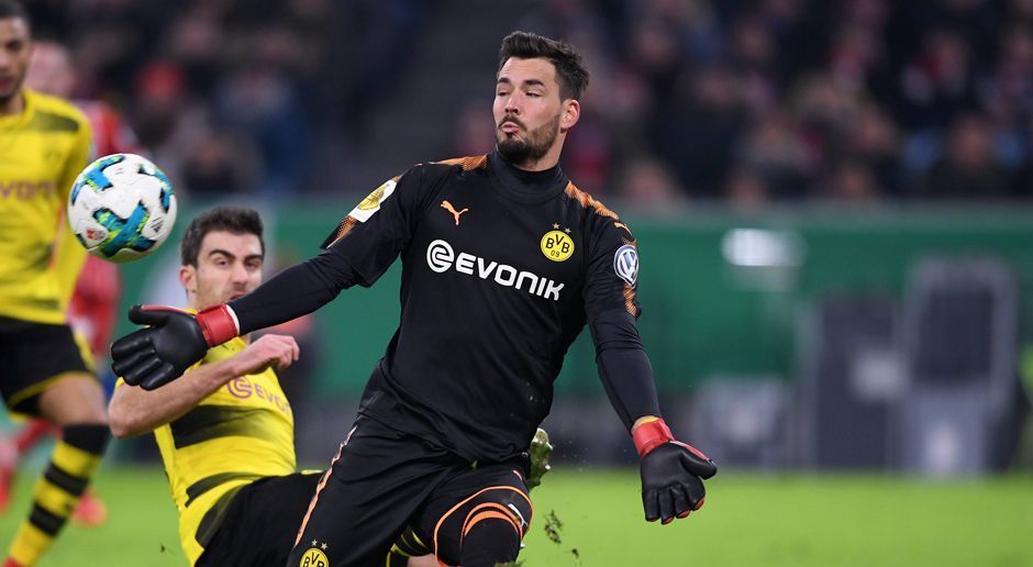 
                <strong>Roman Bürki</strong><br>
                Der Keeper bewahrt sein Team vor einer höheren Pleite. Mit einer Riesentat gegen Lewandowski verhindert er den frühen Rückstand. Vor dem 0:1 durch Boateng lenkt der Schweizer einen Kopfball von Süle noch bravourös an die Latte. Bei Müllers Heber ins Glück muss er sich aber geschlagen geben. Auch nach der Pause zeigt er starke Reflexe. ran-Note: 1
              