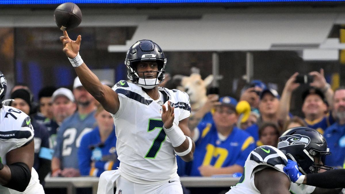 Seattle Seahawks quarterback Geno Smith (7) throws a seven yard pass to receiver Jaxon Smith-Njigba against the Los Angeles Rams during the fourth quarter at SoFi Stadium in Inglewood,California Su...