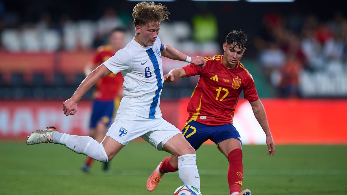 (251015) -- CASTELLON, Oct. 15, 2025 -- Angel Ortiz (R) of Spain vies with Matias Siltanen of Finland during the 2027 UEFA U-21 Qualifiers football match between Spain and Finland at SkyFi Castalia...