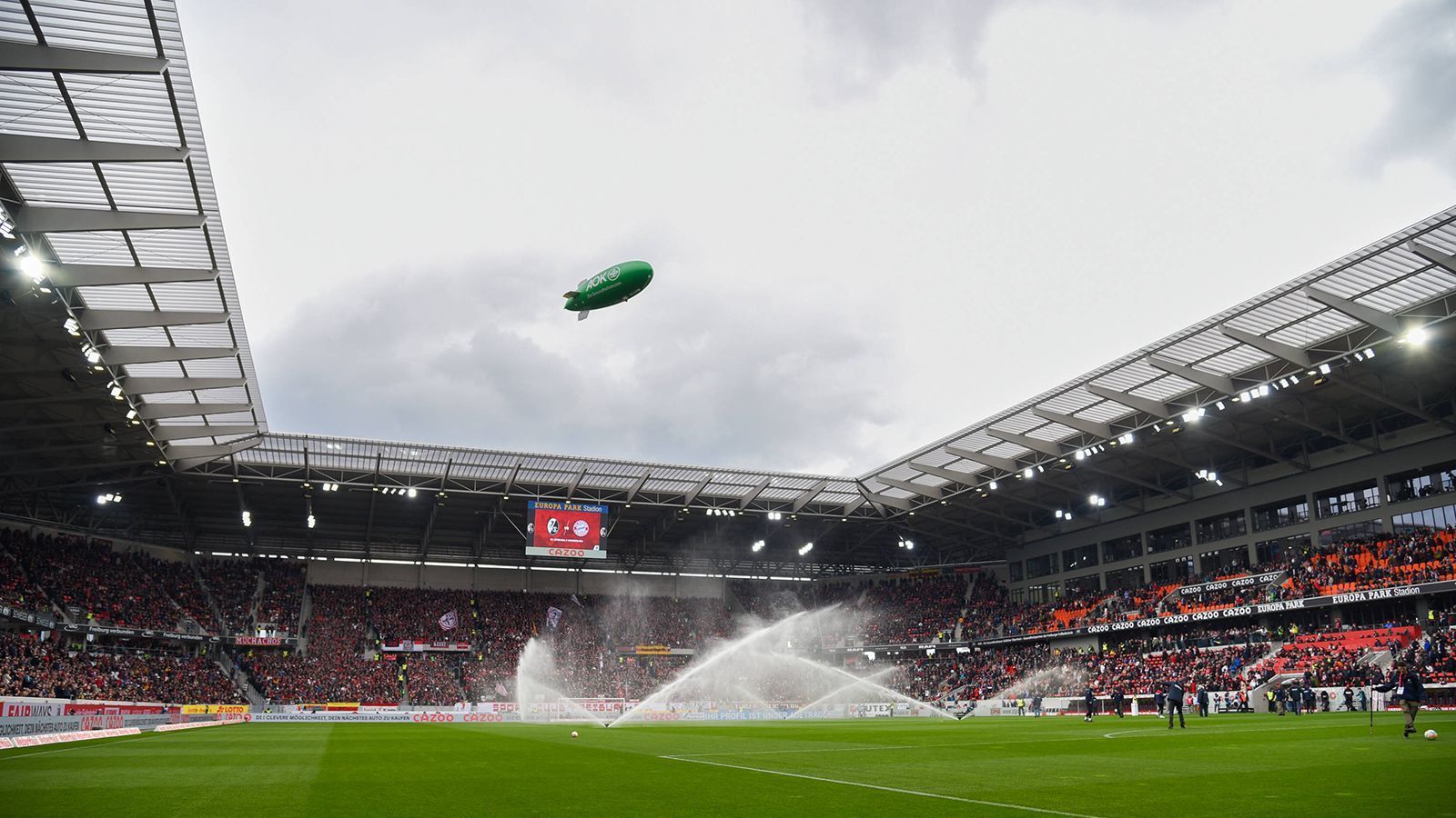 
                <strong>SC Freiburg </strong><br>
                &#x2022; Aktueller Name: Europa-Park Stadion<br>&#x2022; Eröffnung des Stadions: Oktober 2021<br>&#x2022; Altes Stadion: Dreisamstadion<br>
              