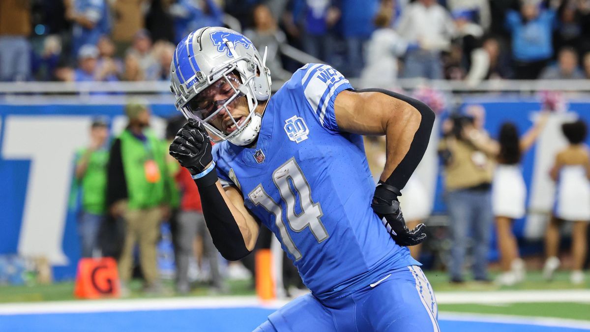 DETROIT, MI - NOVEMBER 19: Detroit Lions wide receiver Amon-Ra St. Brown (14) performs a celebratory dance after catching a pass in the end zone for a touchdown during an NFL, American Football Her...