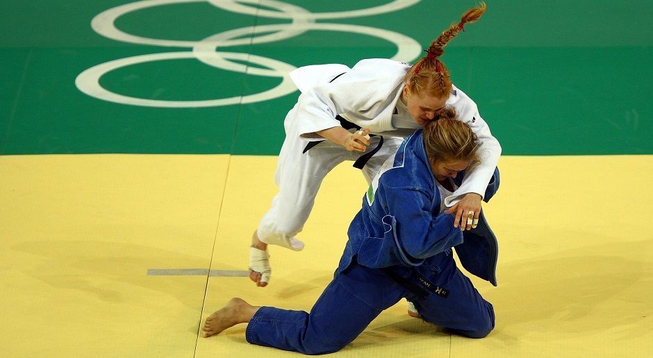 
                <strong>Ronda Rousey bei den Olympischen Spielen 2008</strong><br>
                Ronda Rousey nahm zweimal an den Olympischen Spielen teil. 2004 war sie mit 17 Jahren die Jüngste unter den Judokas in Athen und erreichte Platz 18. 2008 gewann sie in Peking mit einem Sieg über die Deutsche Annett Böhm Bronze.
              