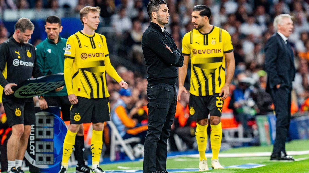 22.10.2024, Real Madrid vs. Borussia Dortmund, UEFA Champions League, 3. Spieltag Nuri Sahin (Borussia Dortmund, Trainer) ist unzufrieden, unglücklich, ebenso Emre Can (Borussia Dortmund, 23) vor s...