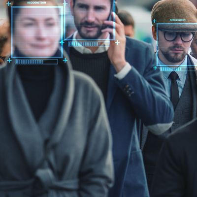 Crowd of Business People Tracked with Technology Walking on Busy Urban City Streets. CCTV AI Facial Recognition Big Data Analysis Interface Scanning, Showing Personal Information. Surveillance Concept