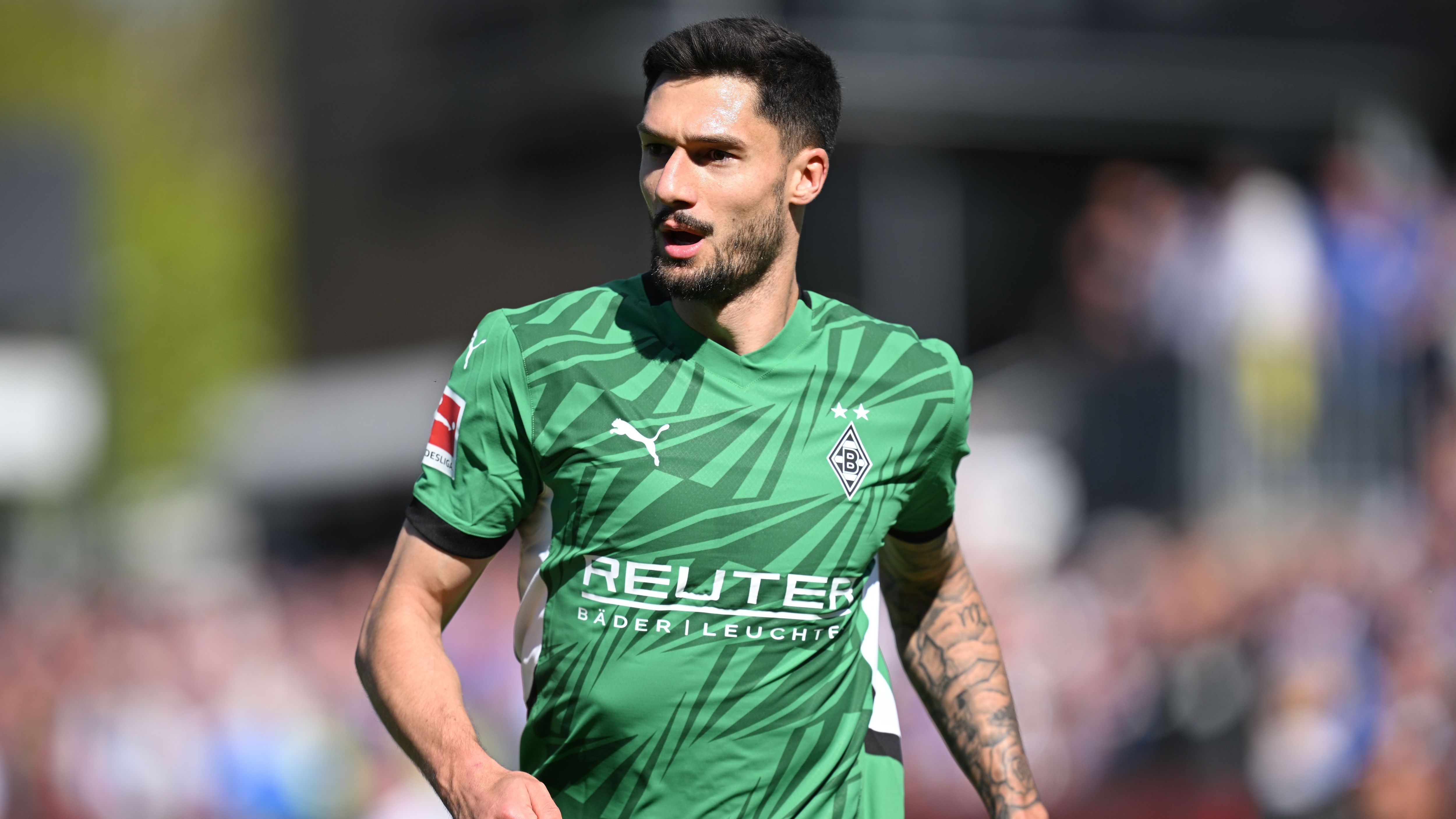 <strong>Platz 11: Borussia Mönchengladbach</strong><br>durchschnittliche Reisedistanz zu Auswärtsspielen 2025/26: 302 km