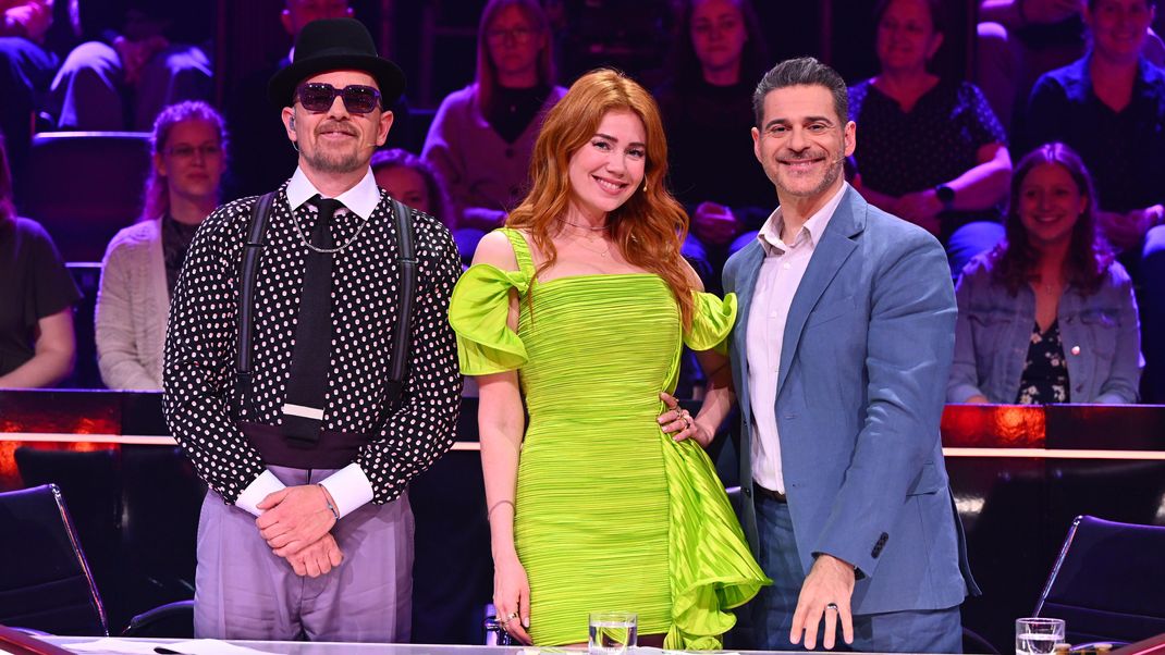 Palina trug bei "The Masked Singer" ein kurzes Kleid in frischem Grün.
