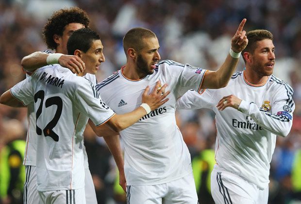 
                <strong>Real Madrid - Bayern München 1:0</strong><br>
                Auch die anderen Teamkollegen kommen gern zum Jubeln vorbei. Auf welchen Gratulanten Angel di Maria, Pepe, Benzema und Ramos (v. l.) hier wohl warten?
              