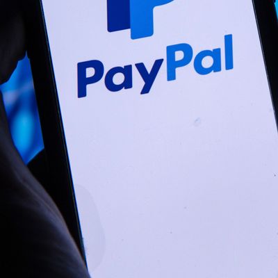 LONDON, UK - August 2021: Paypal finance service logo on a smartphone