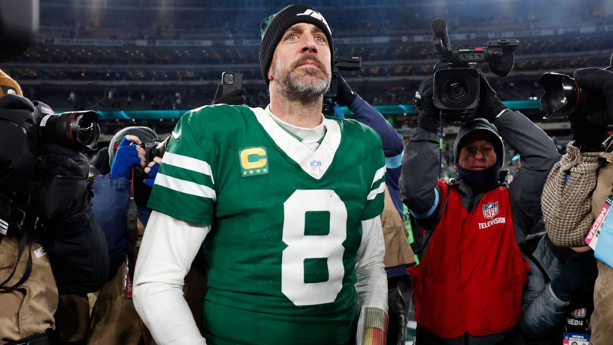 New York Jets quarterback Aaron Rodgers walks on the field after the game against the Miami Dolphins where he threw his 500th touchdown pass in his 20-year career in the final week of the NFL, Amer...